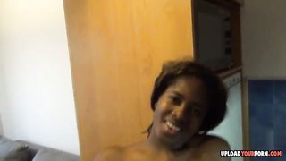 Ebony fingers her pussy after a nice striptease