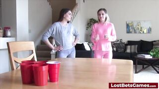 Strip Pong with the loser licking the winner's pussy