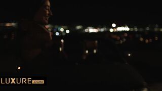 Lesbian threesome in front of some friends